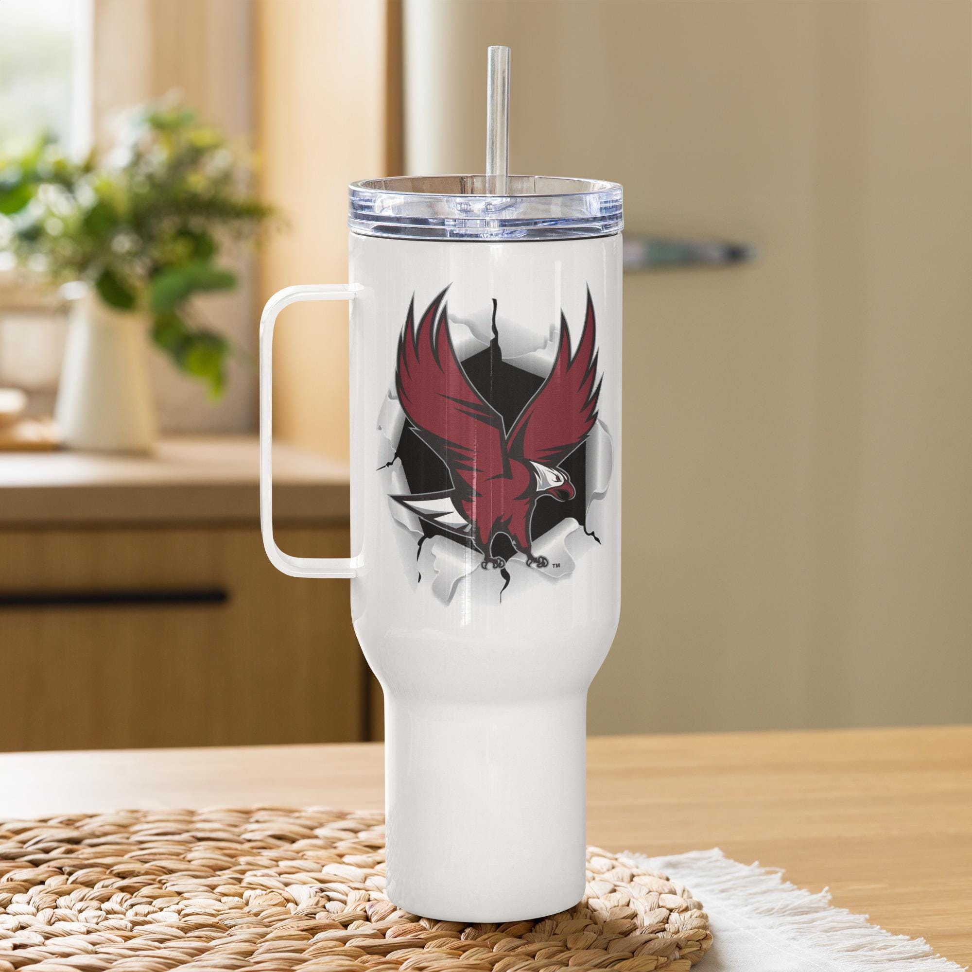 Travel mug with a handle